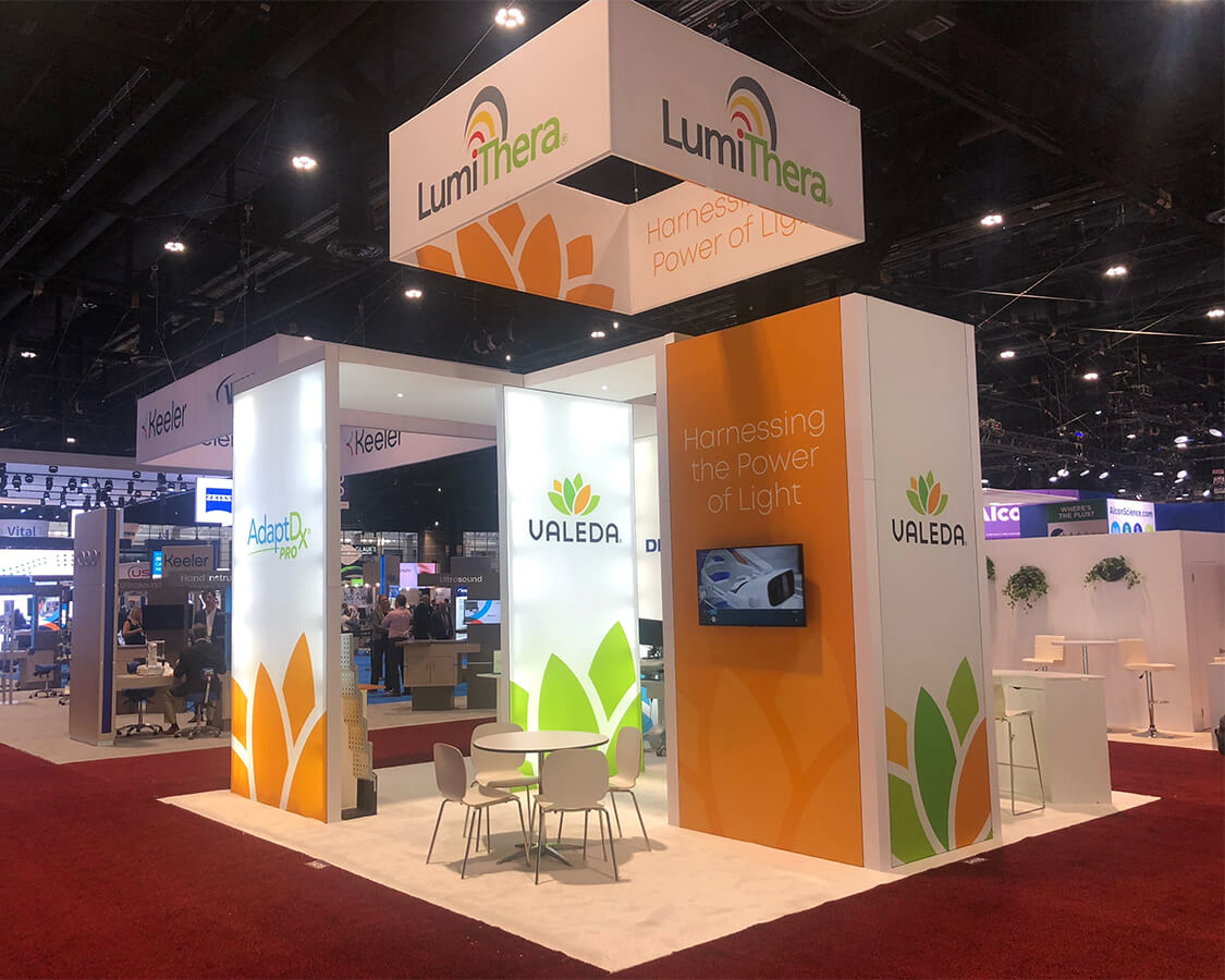 Turnkey 20x20 booth for LumiThera at AAO, Designed and built by Exponents in Chicago
