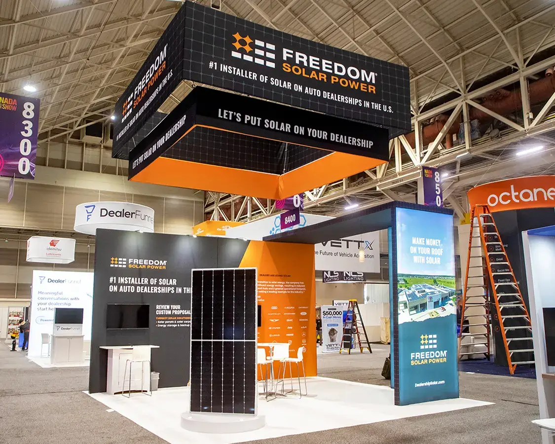 20x20 Trade Show Booth Rental for Freedom Solar Power at NADA Show, Designed and Built By Exponents in New Orleans