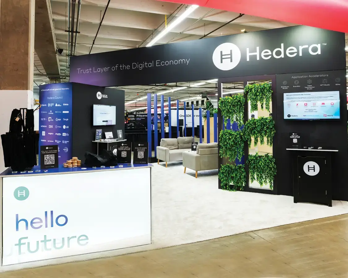 20×20 Trade Show Booth Rental for Hedera at ETH Denver, Designed and Built by Exponents in Denver, CO 20×20 Trade Show Booth Rental for Hedera at ETH Denver, Designed and Built by Exponents in Denver, CO