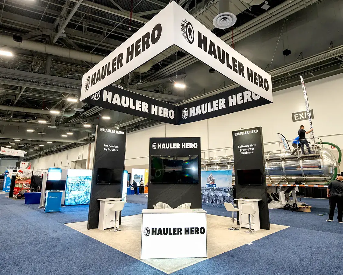 20×20 Trade Show Exhibit Booth for Hauler Hero at Waste Expo Show, Designed and Built By Exponents in Las Vegas