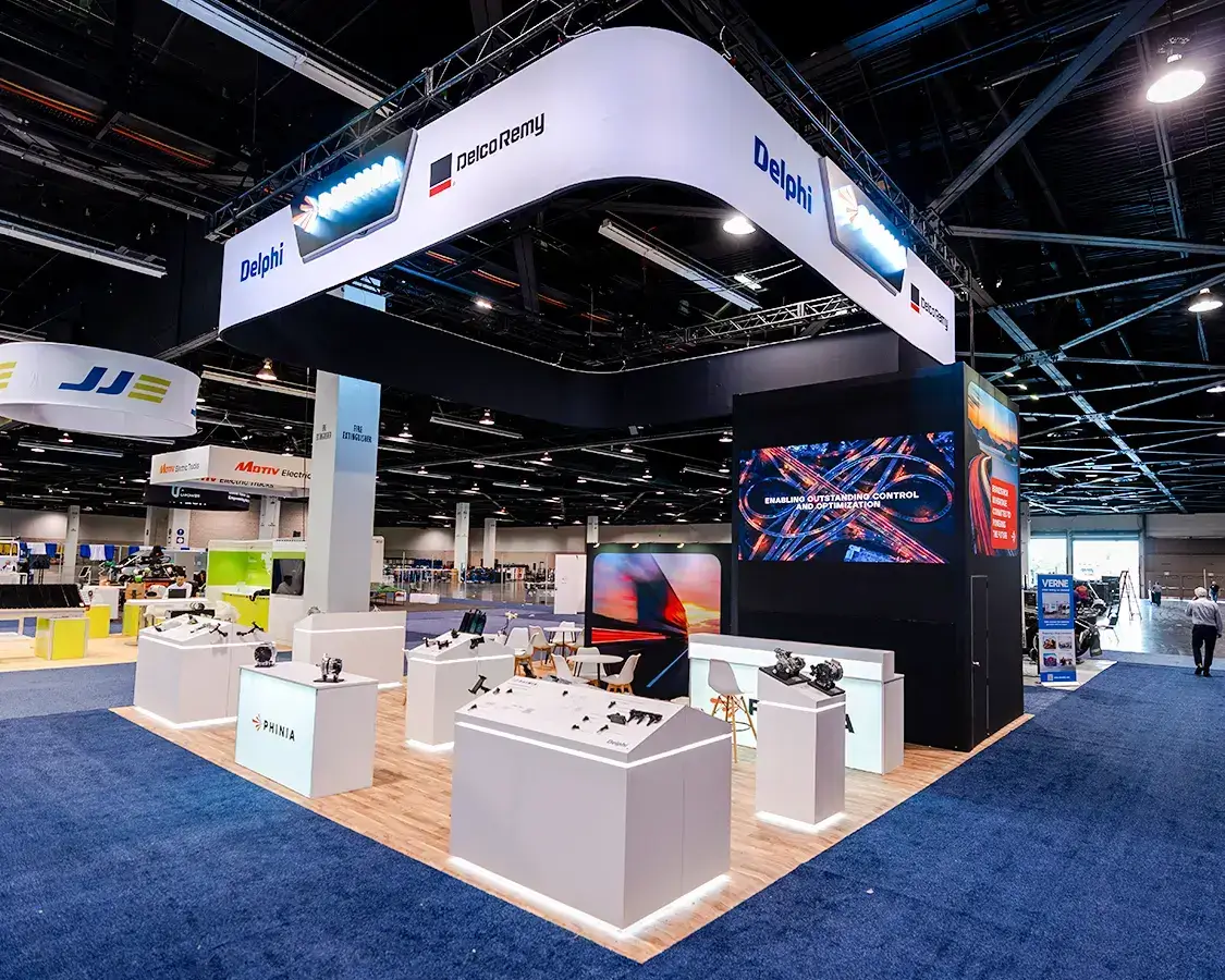 30×30 Trade Show Exhibit Booth for Phinia inc At ACT Show, Designed and Built By Exponents in Anaheim 30×30 Trade Show Exhibit Booth for Phinia inc At ACT Show, Designed and Built By Exponents in Anaheim