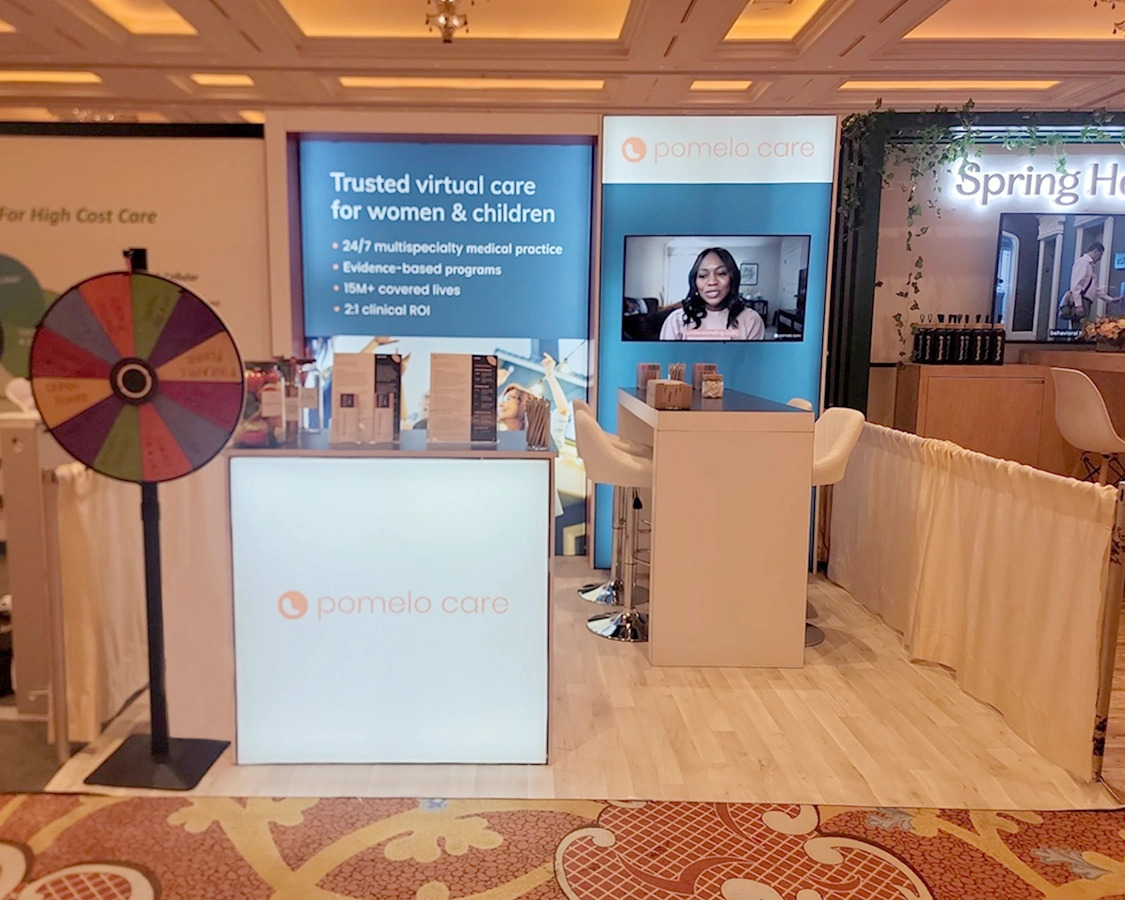10x10 Trade Show Display for Pomelo Care at AHIP, Designed and Built by Exponents in Las Vegas