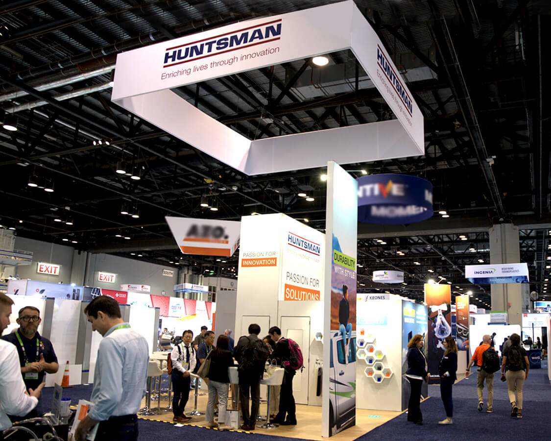 20x20 Exhibition Stand Rental for Huntsman at NPE Show, Designed and Built By Exponents in Orlando