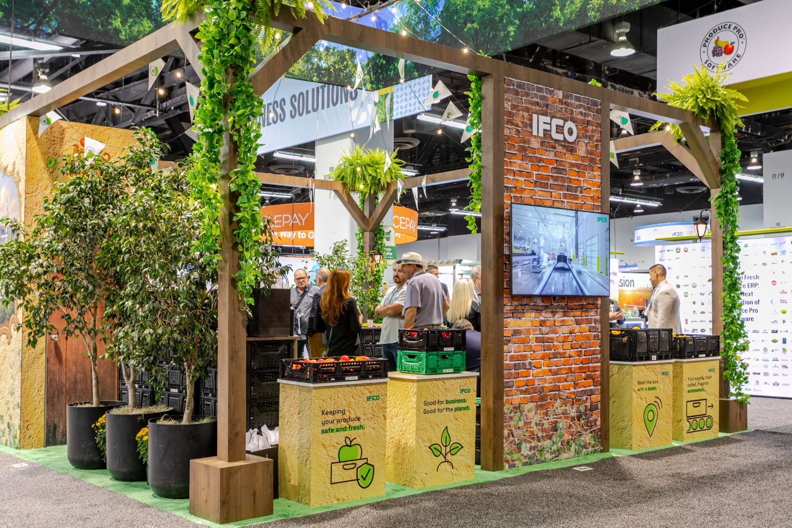 Earthy back wall & accents - 20x20 Trade Show Booth at Global Produce Floral Show 2025, Anaheim, CA