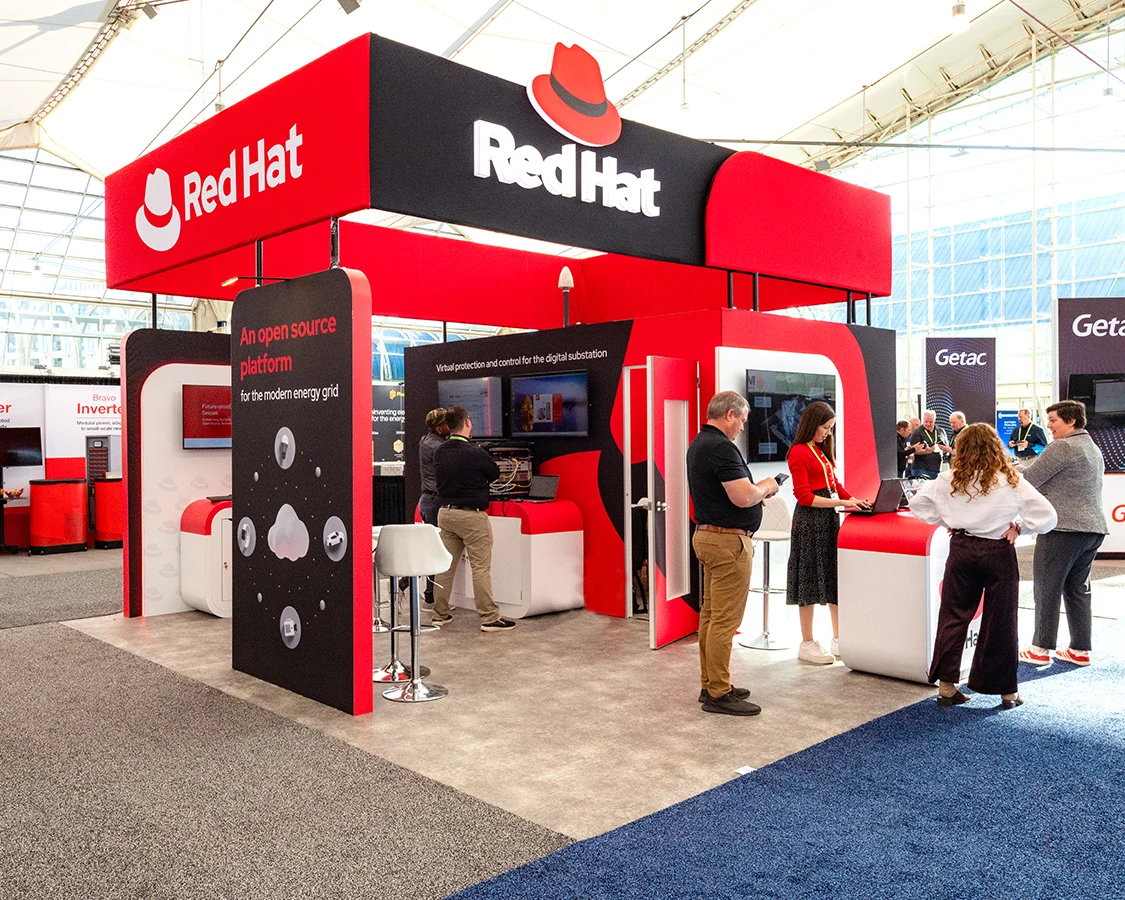 20x20 Trade Show Booth for red hat at Distributech 2026, Designed and Built By Exponents in San Diego, CA