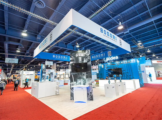 40x40 custom trade show booth by Exponents at AHR Expo 2026 in Las Vegas with overhead hanging sign.