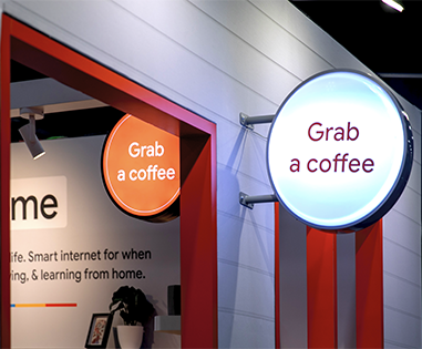 Google Fiber coffee signage area attracting visitors at Des Moines event