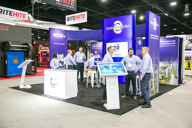 20x20 Trade Show Exhibit for Systems in Motion at MODEX Designed and Built by Exponents in Atlanta, GA